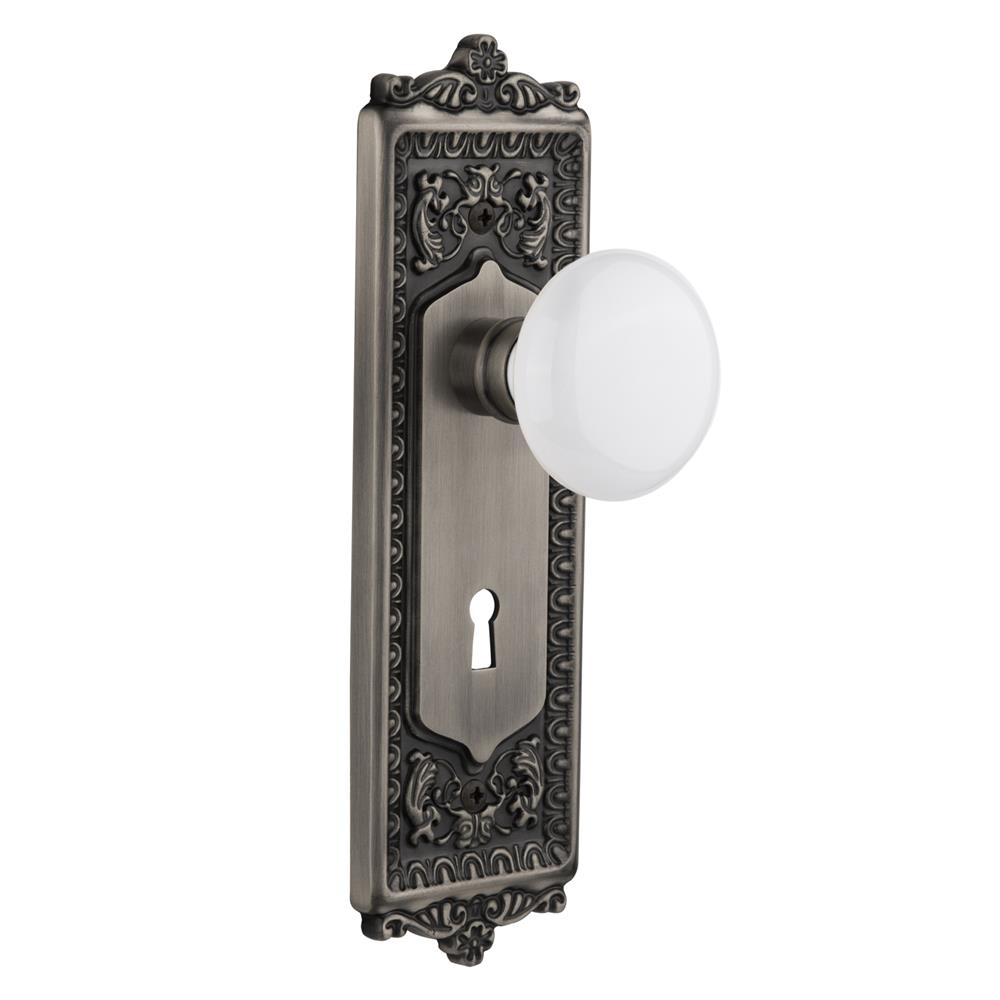 Nostalgic Warehouse EADWHI Passage Knob Egg and Dart Plate with White Porcelain Knob and Keyhole in Antique Pewter